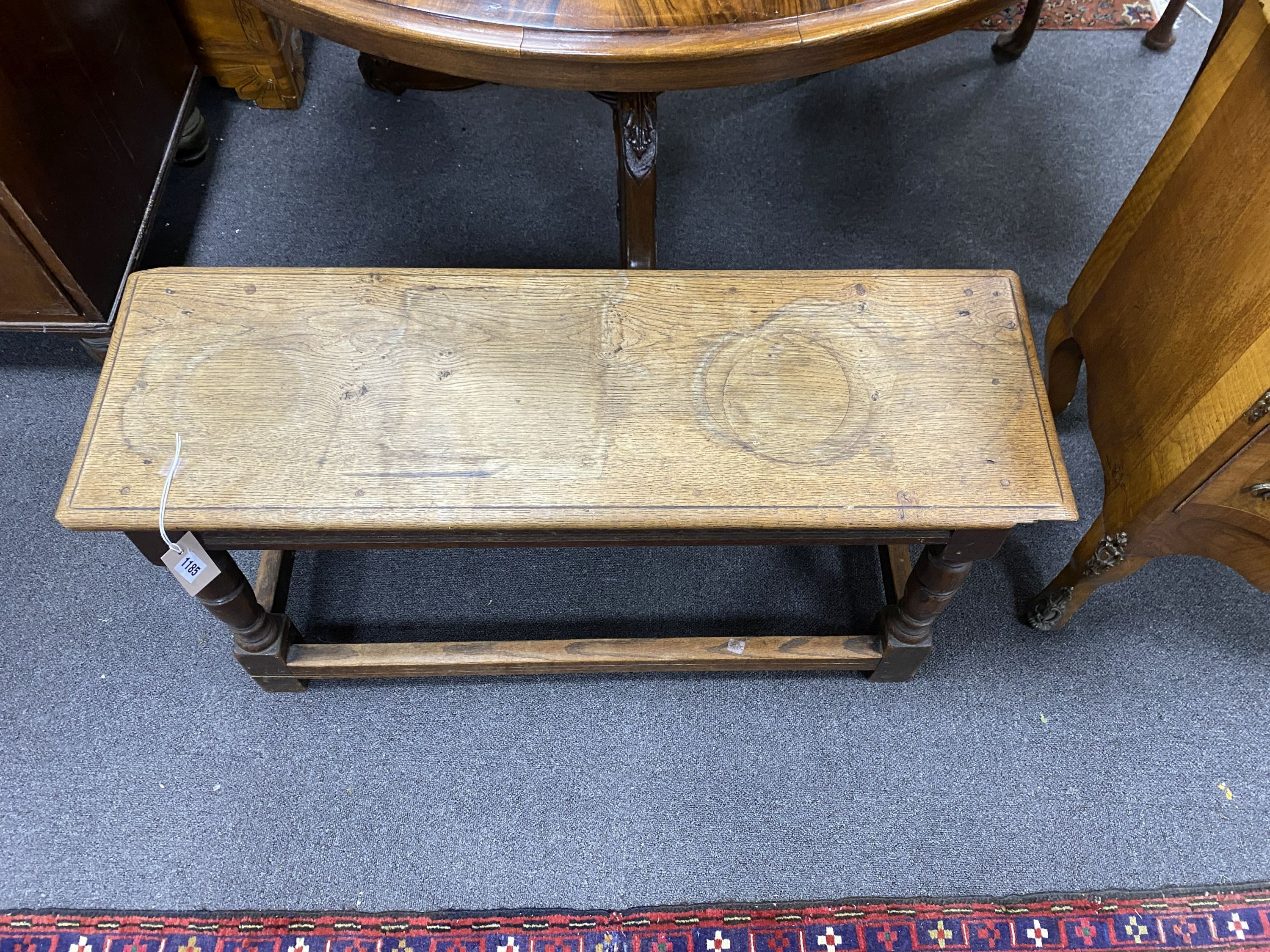 An 18th century style oak stool, length 92cm, depth 30cm, height 46cm